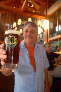 David Bernard proudly holds up the Blue Ridge Hop Revival made with his Madhops.