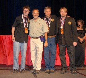 Photo Courtesy of Heidi Crandall : ©www.nelsoncountylife.com : Aaron Reilly, (brewer at DBBC), Charlie Papazian, with the Brewers Association, Steve Crandall (owner DBBC) and Jason Oliver, (head brewmaster) at DBBC accept their awards Saturday night in Denver.  