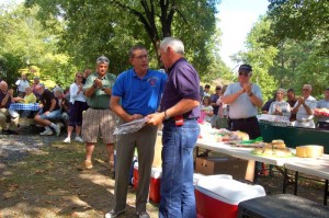 Photos By Tommy Stafford : ©2010 www.nelsoncountylife.com : Eddie Embrey (left) President of The Emergency Services Council & Faber Fire Chief, congratulates Milton Harris on 40 years of volunteer service with the Lovingston Fire Department at this past Sunday's (9.12.10) Appreciation Day held at Lake Monacan in Nellysford, Virginia. Click on any photo to enlarge. 
