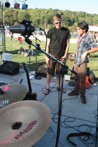 Rob Mezzanotte (right) talks with one of the sound engineers at The Festy. 
