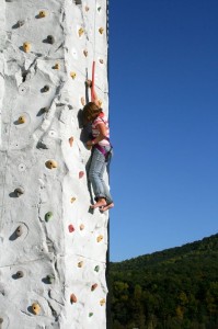 In addition to music, this youngster took a stab at the rock climbing wall. 