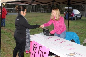 Pink ribbons with Alexis' picture were sold at Friday night's football game against Campbell County. The money raised was given to the family of Alexis Murphy to help with expenses. October 25, 2013