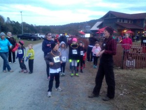 Laura Wolf helps coordinate the kids fun run that kicked off about 30 minutes before dark fell and the main race started. Laura and buddy Kerri Faust always help set up the fun run at each race. 