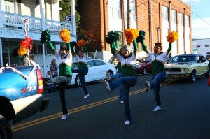 Cheerleaders kick up their heels this past Sunday afternoon - December 1, 2013 at the annual Lovingston Christmas Parade. 