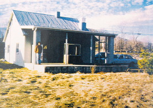 This is what Basic Necessities looked like long before it was the restaurant today. It was a home, a bakery, then Basic Necessities. This is around 1997 shortly before it became Basic. You can see Kay on the far left side of the porch looking toward the camera. 