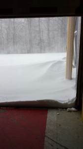 Photo Courtesy Of Curtis Sheets - Chief at Wintergreen Fire & Rescue : With winds howling in excess of 50 MPH at times, 1 foot snow drifts formed outside the WF&R bay doors Sunday morning. 