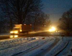 ©2014 Blue Ridge Life : Photo By Tommy Stafford : Cars & Trucks make their way down Route 151 in Nelson's Rockfish Valley Sunday evening after moderate snow began falling across the area once again. 