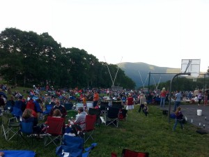 Photo courtesy of Wintergreen Resort: People packed what's normally the ski slopes in the winter, just before dark at Wintergreen Resort to view the annual fireworks on July 4th, 2014. 