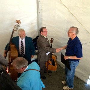 Charles Frazier (center) lead singer and guitarist for The Virginia Ramblers congratulates Donald Burland backstage (right) on 9 great years at the Blue Ridge Mountain Music Festival. Don has put together all of the performances during that time and is retiring after this festival. Thanks for a great job Don! 