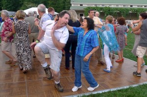 ©2014 Blue Ridge Life : Photos By BRL Mountain Photographer Paul Purpura : Ski Instructor Kevin "Chocolate Man" Sumpter dances with his partner Lisa Morales this past Saturday evening - August 9, 2014 at Starry Nights held at Veritas Vineyard & Winery in Afton. 