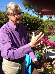 Earl Hamner checks on one of his many Bonsai plants in his outdoor garden at his home in Studio City, California. 