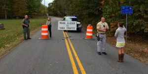 Photo Courtesy of Hawes Spencer : Police block off a large area surrounding Walnut Creek Park in Albemarle County where they say a female body was discovered Saturday afternoon - October 18, 2014. 