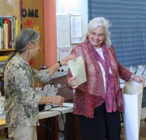 Photo Courtesy of NBS: Virginia Naturally Schools Chairperson Suzie Gilley (R) presents a certificate for the 15th year of recognition for environmental education and stewardship to North Branch School science teacher Toni Ranieri (L).