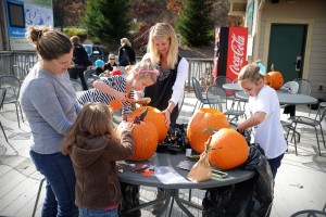 ©2014 Blue Ridge Life : Photo by Paul Purpura : Moms & kids had a great time carving pumpkins this past weekend at Wintergreen Resort. It was just one of the many activities held during Harvest Fest Weekend I. Harvest Fest Weekend II is being held this coming weekend at Wintergreen. 