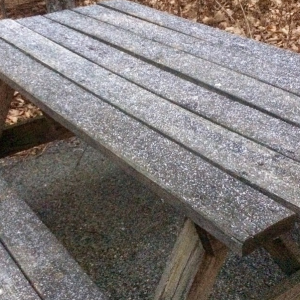 Photo By Tommy Stafford: Light snow began covering this picnic table at The Nature Foundation At Wintergreen Thursday evening - November 13, 2014. 