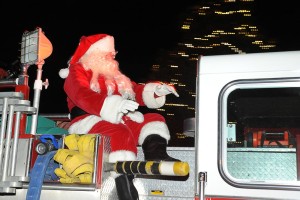 The man of the hour! Santa Claus arrives atop a fire engine from Wintergreen Fire & Rescue!