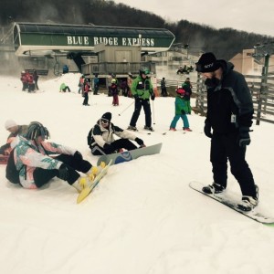 ©2014 Blue Ridge Life Magazine : Photos By Yvette Stafford : The weekend before Christmas was a perfect time for people to hit the slopes at Wintergreen Resort this past Saturday - December 20, 2014. Above boarders chat it up.