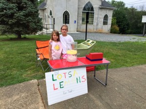 ©2015 Blue Ridge Life Magaine : Photos By Jon Goff : Sisters Molly & Natalie Lynch of Lovingston are back for the second year at their lemonade stand to help raise money for The Nelson Food Pantry.  