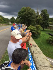 ©2015 Blue Ridge Life Magazine: Photo By Woody Greenberg : As part of Hands To Protect Our Land, dozens of people line the stone bridge crossing over Route 250 on Afton Mountain where it meets Blue Ridge Parkway Tuesday evening - August 19, 2015 