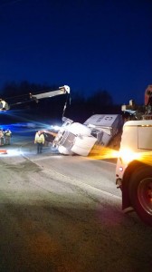 Photo Courtesy of Lovingston Volunteer Fire Department : An overturned tractor trailer at Oak Ridge Road and US 29 in South Nelson County slowed traffic in the northbound lane as crews worked to clean up the mess. 