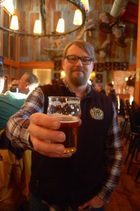 Photo By Tommy Stafford : ©2016 Blue Ridge Life Magazine : Jason Oliver, Head Brewmaster at Devils Backbone Brewing holds up a sample of one of the collaborative brews released this past Monday afternoon January 11, 2016 in Roseland, Virginia. 