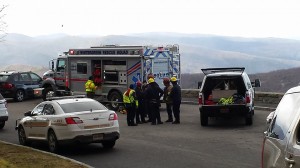 Photo By Bob Clouston : Rescue crews stage at Ravens Roost Overlook Sunday afternoon - January 10, 2016 where a body was discovered below. 