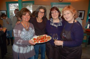 ©2016 Blue Ridge Life Magazine : Photo By Tommy Stafford : Basic Necessities co-owners Rosie Gant & Kay Pflatz on left are joined by Annalaura Tili and her mom on the far right. They are the owner of Tili Winery & Vineyard outside of Assissi in Umbria, Italy. The family produces  all organic wines and olive oil.