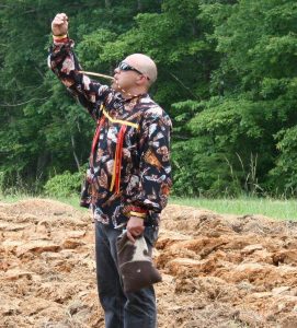 Mekasi Horinek, of the Ponca Tribe of Oklahoma, blessed the land in four directions using sacred tobacco and an eagle bone whistle this past Monday - June 6, 2016 in Winginia, Virginia