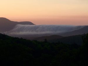 Photo by Robert Stull : Robert grabbed this beautiful shot of the clouds dropping over Bald Mountain as seen from the Blue Ridge Parkway. It almost looks like a waterfall. 