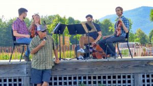 Photos courtesy of John Taylor : Steve Crandall, founder of Devils Backbone Brewing Company in Roseland, introduces The Aurelius String Quartet, this past Sunday evening - July 10, 2016. The group was performing on the stage at DBBC as part of The WPA Summer Music Festival 2016. 