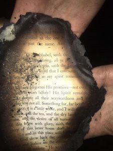 Photo By Katie Gunter Franklin : This passage from a family bible was salvaged from the fire in Gladstone - Sunday - July 17, 2016