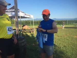 ©2016 Blue Ridge Life Magazine : Photos By Yvette Stafford : Bpb Clouston of Wintergreen gets ready to run the Corkscrew Racing Full Nelson 5K this past Saturday morning - July 22, 2016 at Blue Mountain Barrel House in Arrington, Virginia. The temps were hovering in the lower 80s at racetime. 