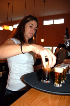 Photo By Tommy Stafford : Mandi Smack, co-owner of Blue Mountain Brewery, prepares a sampler tray of all of the beers they make at their newly opened brewery in Afton back on October 24, 2007. 