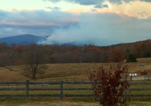 Photo Courtesy of Jake Campbell : Heavy smoke blankets an area near Big Mt. Pleasant easily Sunday morning. Crews have been battling the blaze there since Saturday evening. 