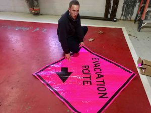Photo By Tommy Stafford : BRL Digital Media Director : Chief Curtis Sheets of Wintergreen Fire & Rescue shows off one of the portable evacuation route signs that would be used in the even of a wildfire emergency on the mountain. Wednesday - December 7, 2016