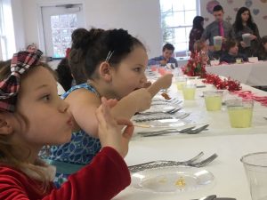These two young ladies practice a bit of proper dining on Valentine's Day during the etiquette luncheon held this past Tuesday - February 14, 2017 at Afton Christian School in Nelson County. 