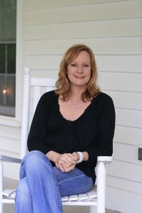Photo By Hayley Osborne : Mary Beth McDonough sits in a rocker on the front porch of Earl Hamner's childhood home in Schuyler, Virginia in May 2011. She along with many other surviving cast members of The Waltons will be returning to Hamner's hometown in March of this year as part of the 45th reunion. 