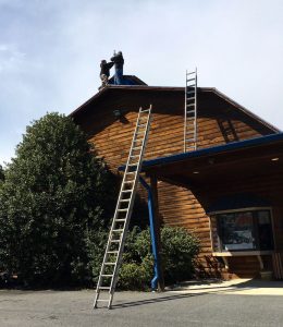 Way up there on the roof at The Ski Barn, Tommy & Clayton put the finishing touches on the latest WeatherNow station in Beech Grove : Friday - March 17, 2017. 