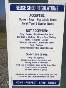 A sign with rules and regulations attached to the left door of the Re-Use shed in Afton / Greenfield. Friday - March 24, 2017. Click to enlarge. 